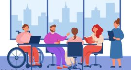 Grupa pracowników biurowych prowadzących rozmowę przy stole podczas spotkania